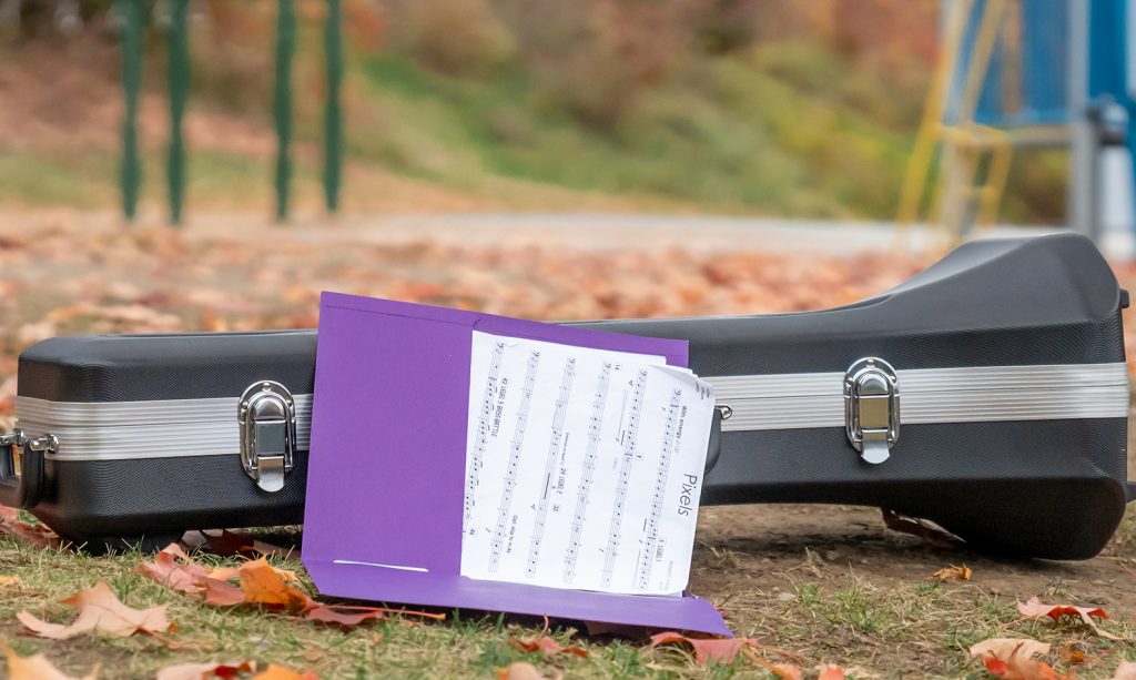 Trumpet case and music on the playground at Bancroft School in Worcester, MA.