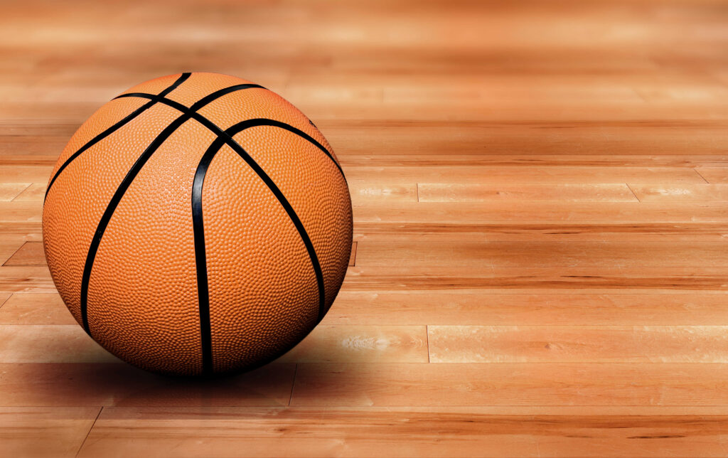 Basketball on basketball court.