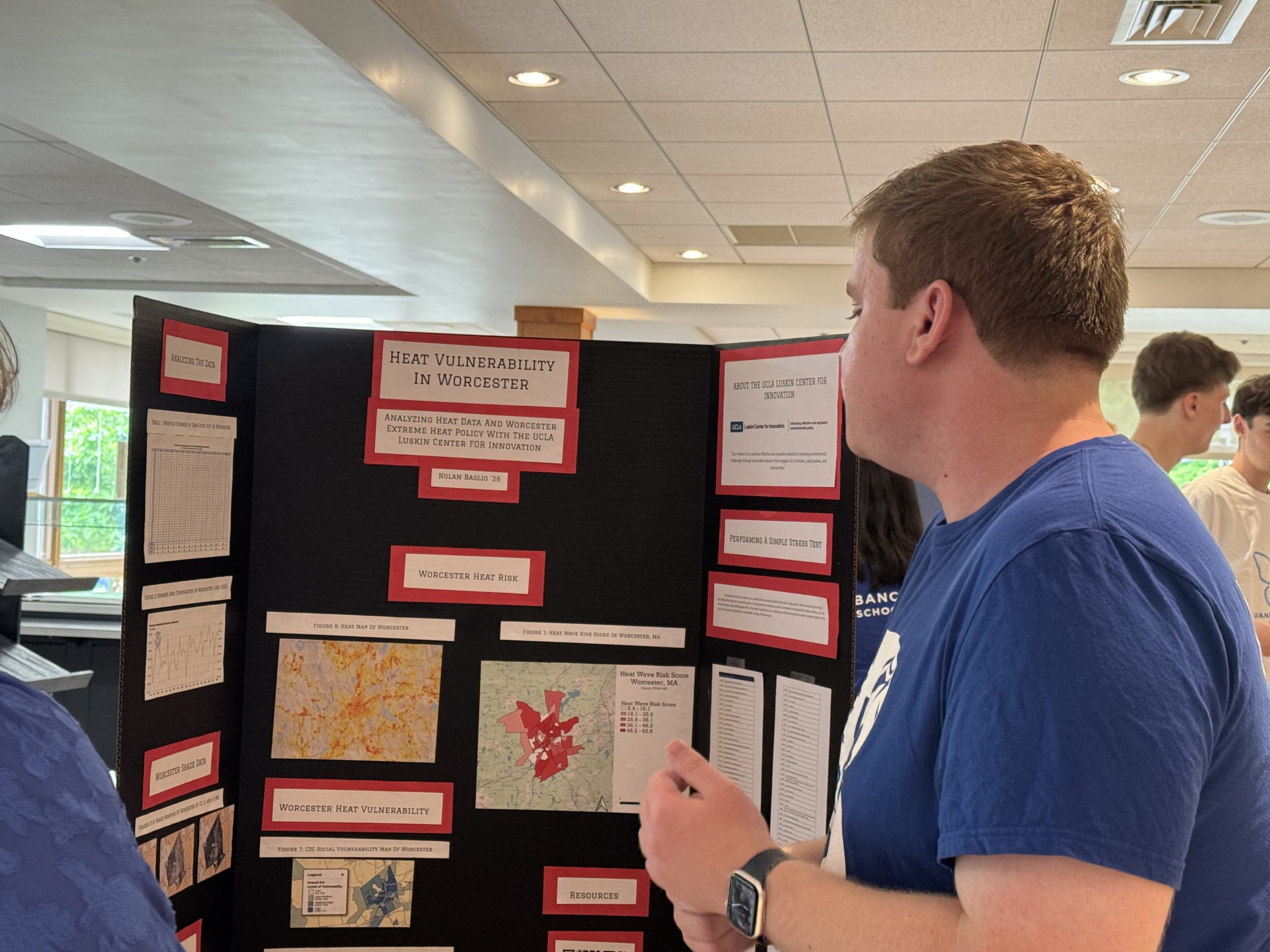 Student at bancroft School in Worcester, MA explains their Senior Co-Op project at the Co-Op Fair.