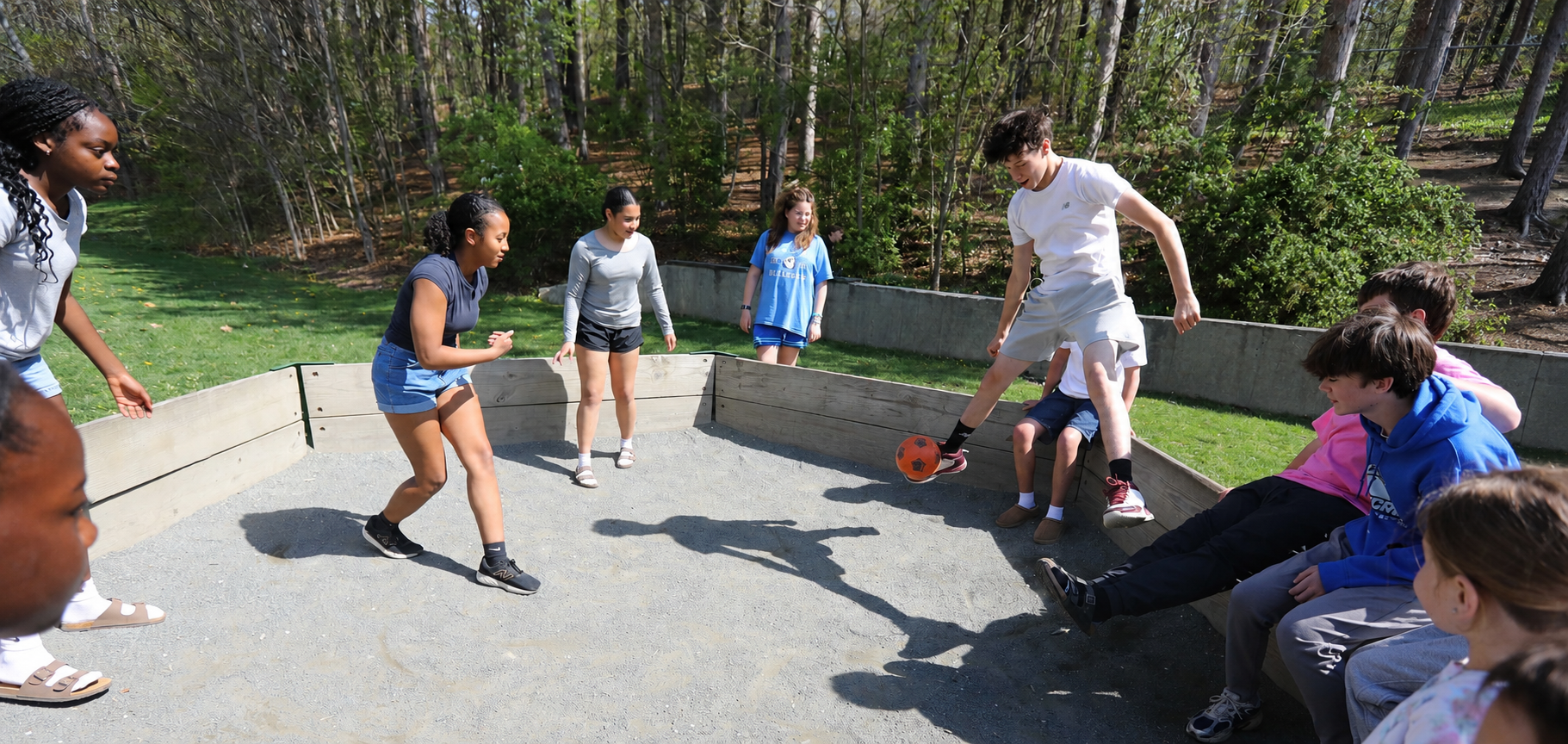Students of various ages at Bancroft School in Worcester playing at recess.
